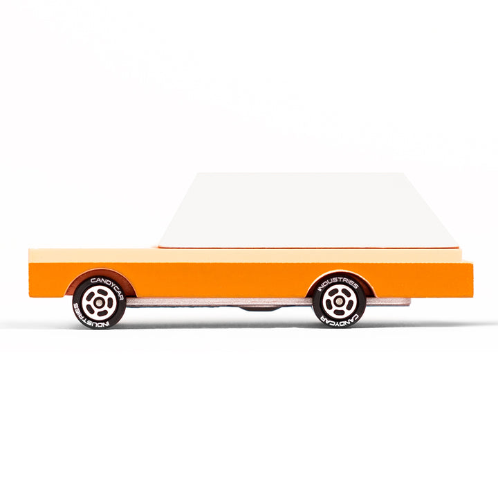 Orange Dart Wagon toy car by Candylab, viewed from the side.