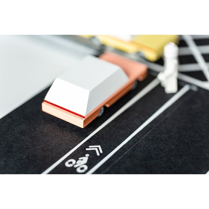 The Dart Wagon by Candylab, displayed on a race track for adventurous play.