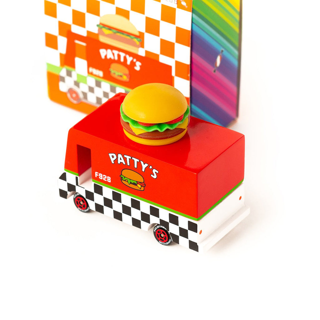 Wooden toy hamburger van by Candylab, shown in its original packaging.