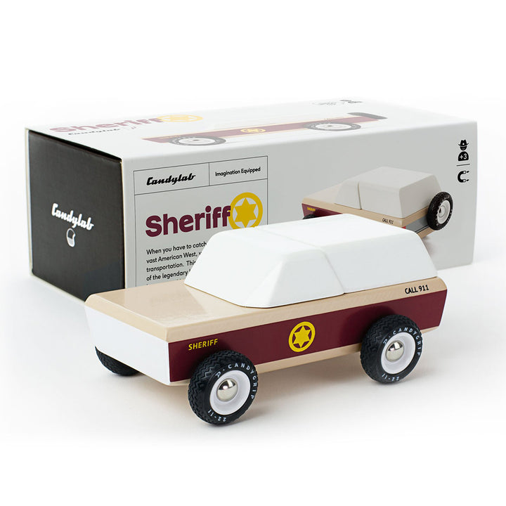 Candylab Lone Sheriff wooden car toy, shown with its packaging for gifting.
