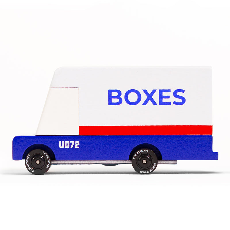 Side of Candylab Toys Mail Van, a wooden delivery truck toy for kids.