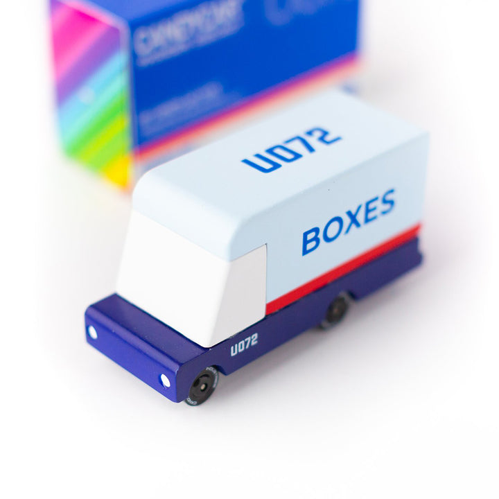 Wooden toy mail van by Candylab, perfect for imaginative delivery adventures.