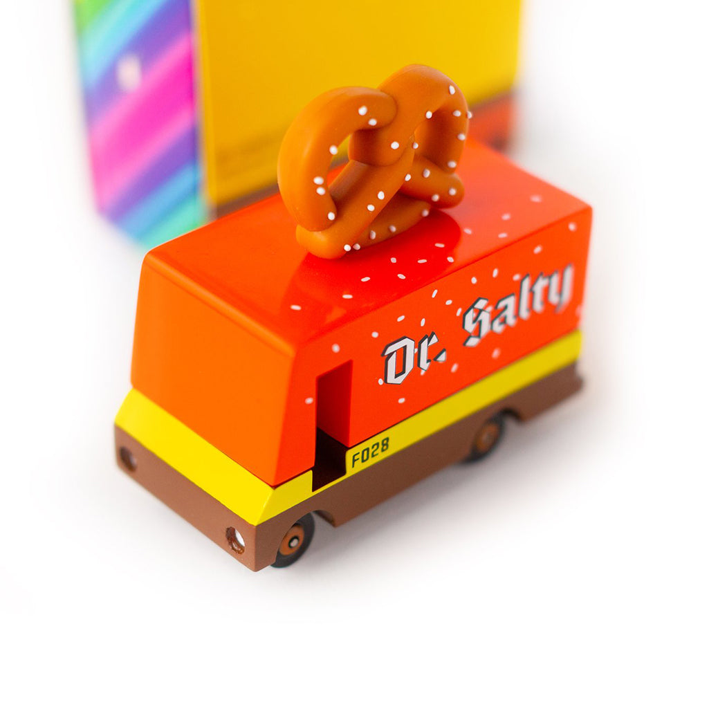 A child-friendly Candylab Toys Pretzel Van, perfect for imaginative food delivery role-play.