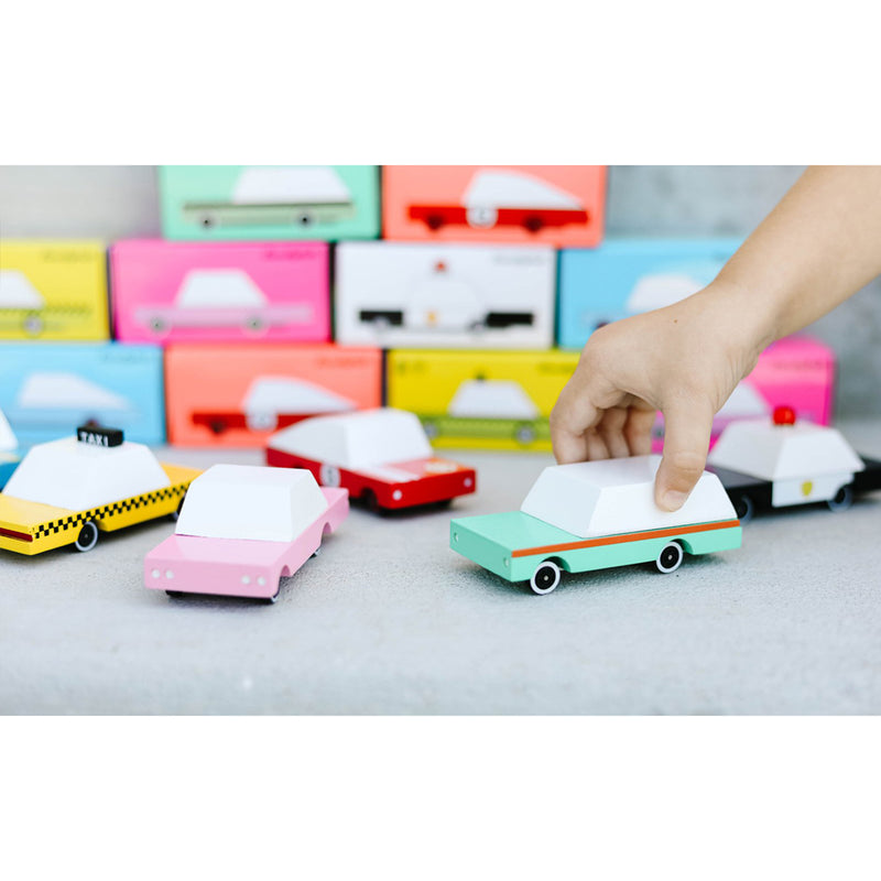 Candylab Toys Teal Station Wagon Wooden Car Toy, a charming, retro-inspired wooden vehicle designed for endless imaginative fun.