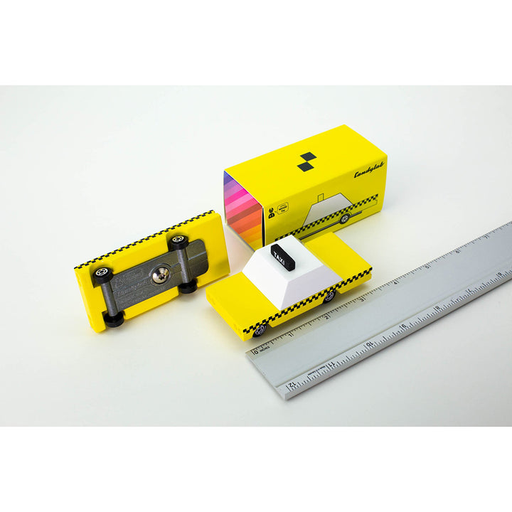 Candylab Toys Wooden Yellow Taxi, designed with a retro-inspired look for kids' creative fun