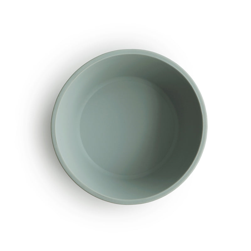 Mushie Suction Silicone Bowls in Cambridge Blue keeps meals secure with a slip-resistant design while adding a touch of elegance to the dining table