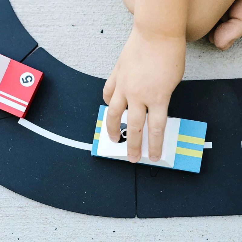 Child Playing with Candylab Toy Speedway Set Cars on buildable Track