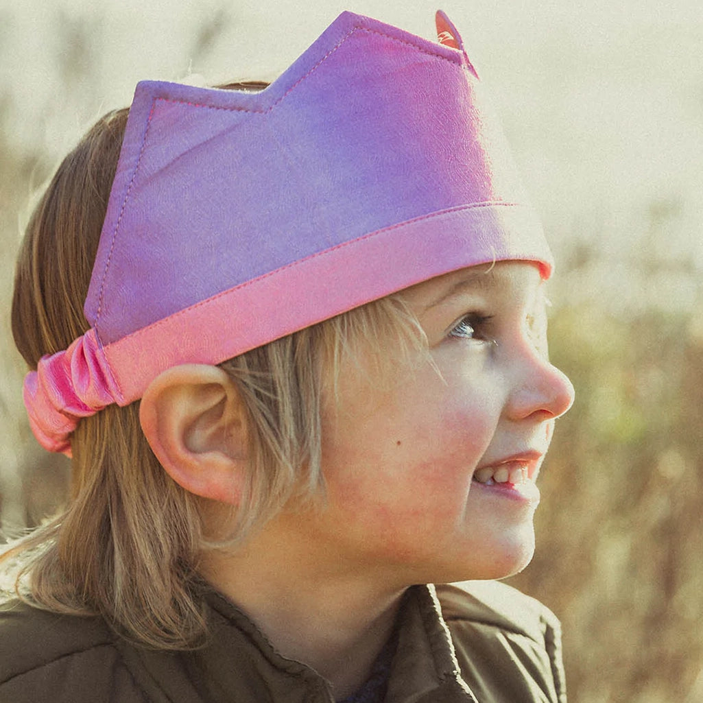 Sarah's Silk Blossom Silk Crown Children's Pretend Dress-Up Crown. Modeled on child smiling.