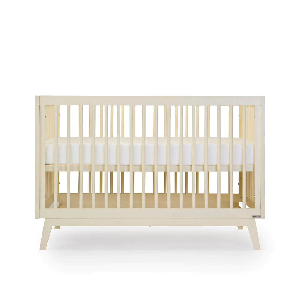 dadada Meringue Soho 3-in-1 Convertible Crib to Toddler Bed Furniture . Light creamy yellow in color. Baby crib sets