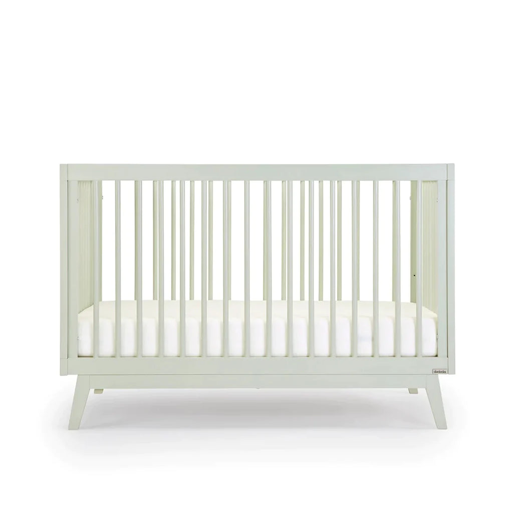dadada Sage Soho 3-in-1 Convertible Crib to Toddler Bed Furniture. Pastel green in color. Front view. Toddler beds for boys