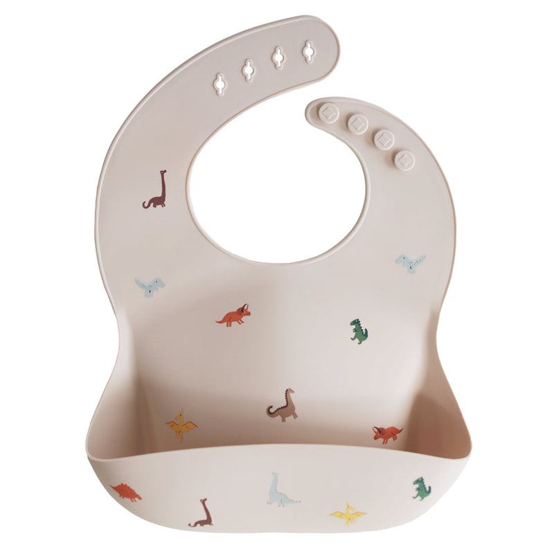 Mushie Dinosaurs Silicone Bib Fun and practical silicone bib with a playful dinosaur design for babies