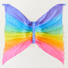 Sarah's Silks Rainbow Fairy Wings Children's Dress-Up Accessory. Ombre rainbow silk dress-up fairy wings for children. Each wing has a small silk loop at the top for children to grab. Elastic loops attached to back of wings for wear.