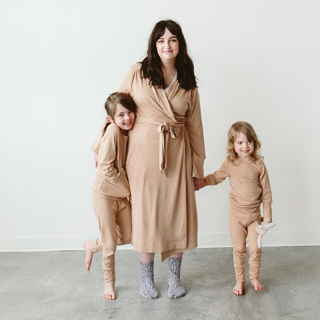 Goumikid's Sandstone Bamboo Organic Cotton Women's Robe. Light brown women's robe with sewn-in tie. Featured on model with children.