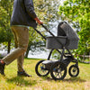 Man Pushing Uppababy Cruz Stroller with Bassinet Accessory