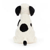 Jellycat Harper Pup. Black & White spotted dog stuffed animal. Back view.