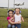 Young girl and baby wearing Banz Hearing Protection Baby Earmuffs near airport