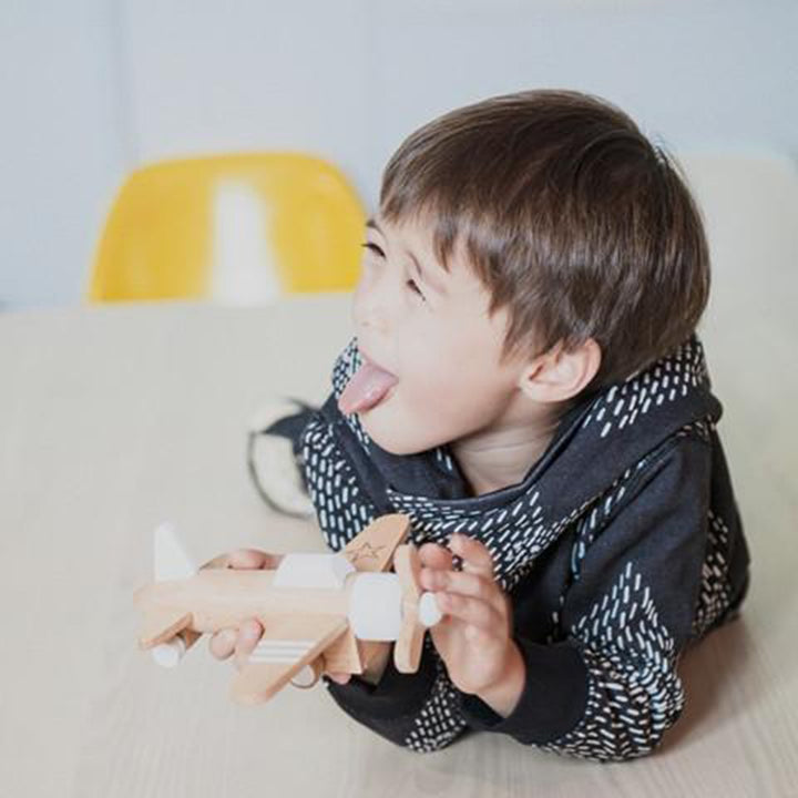 Kiko+ durable wooden airplane toy, designed for hours of imaginative play.