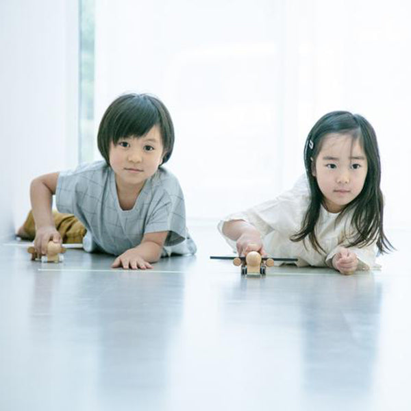 Colorful wind-up jet toys for kids, made from safe materials.