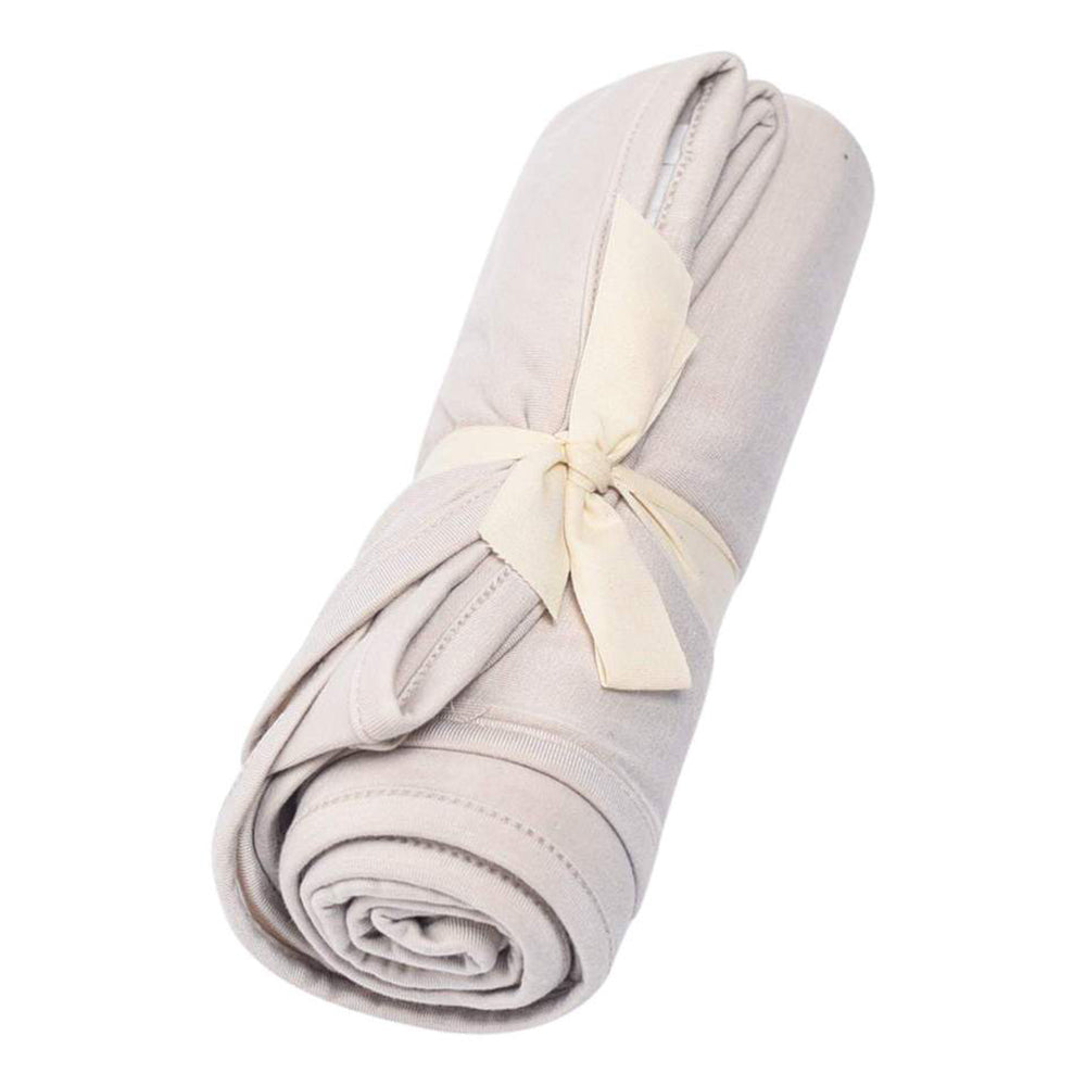 Wrap your newborn in the Oat Kyte Baby Bamboo Swaddle, a cozy baby blanket for gentle comfort.
