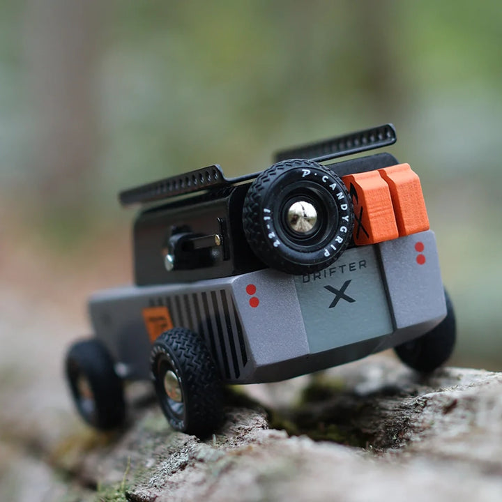 Outdoor scene featuring the Candylab Drifter Kodiak wooden toy car.