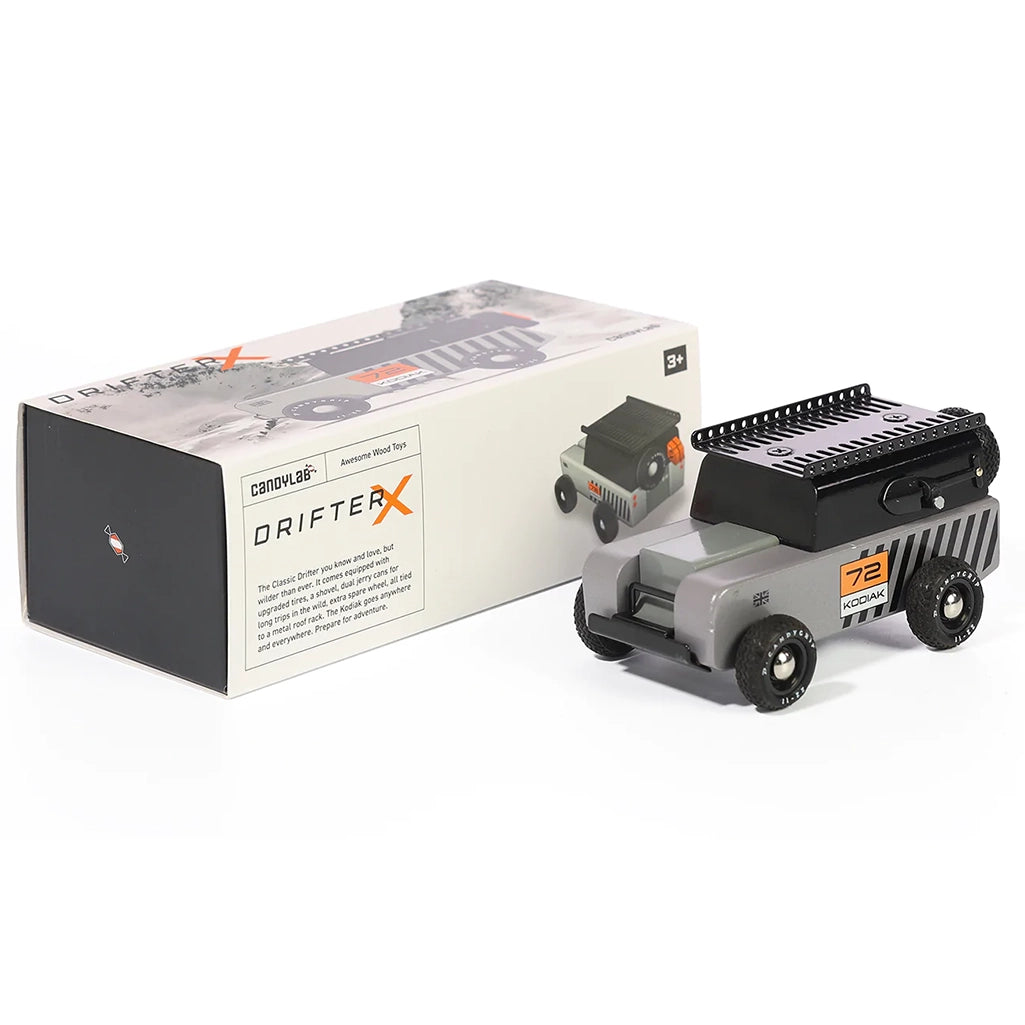 The Drifter Kodiak adventure car by Candylab, displayed with its box.