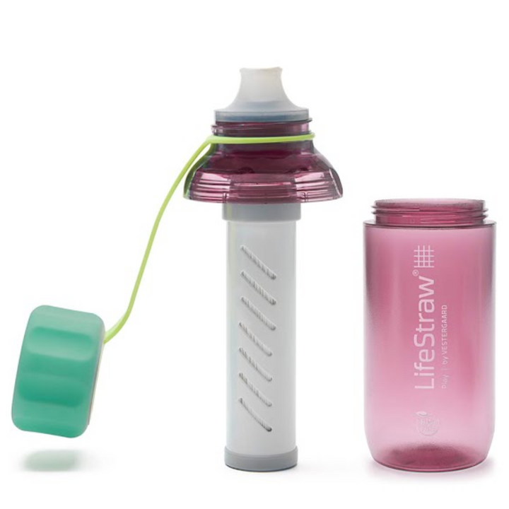 life_style2, LifeStraw's Play Children's Water Bottle with Lead Reduction Filter magenta colored bottle, green cap and cap strap, white mouth piece & filter
