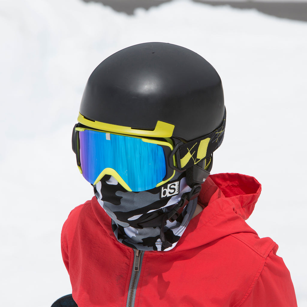 Kid in Snow Wearing BlackStrap Kids The Hood Dual Layer Cold Weather Neck Gaiter & Warmer