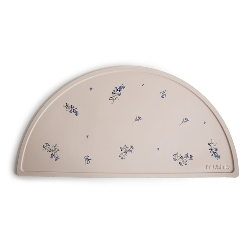 Mushie Placemats in Lilac Flowers Soft lilac floral prints that add a gentle pastel touch to your dining table