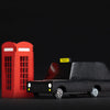Lifestyle image of Candylab London Taxi Children's Wooden Toy Car