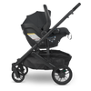 Side of Uppababy Black MESA V2 Infant Car Seat on Cruz v2 Stroller