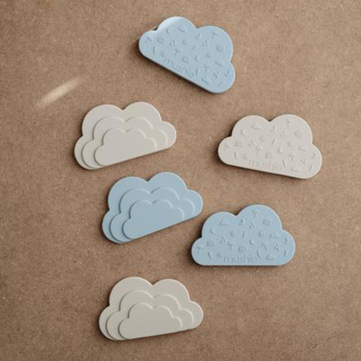 Assorted cloud teethers by Mushie in soft and durable silicone