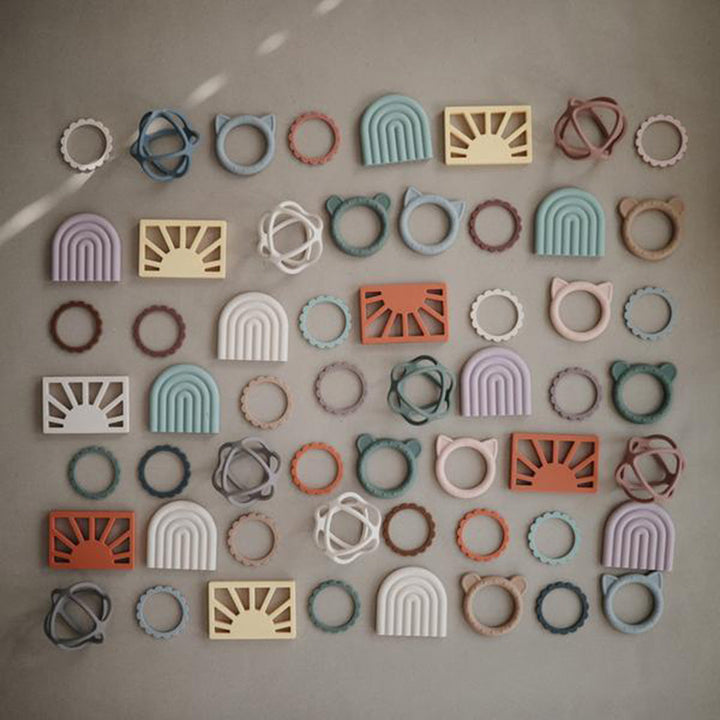 Mushie teething relief products designed to soothe irritated gums and reduce pain