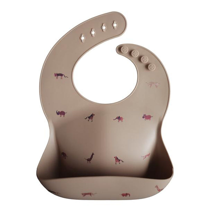 Mushie Safari Tan Safari Tan silicone bib designed for easy cleanup after every mealtime