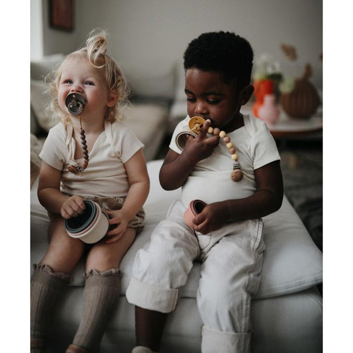 Baby Development Toys Mushie toys designed to support your babyÕs developmental milestones