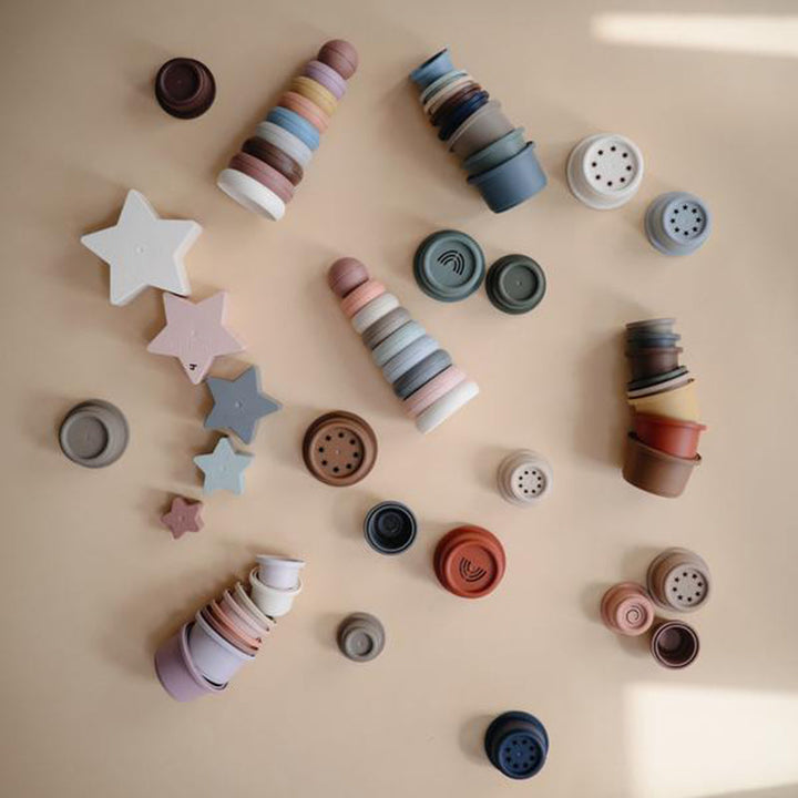 Baby Cup Toys Mushie cup-shaped toys that are great for stacking sorting and fun exploration