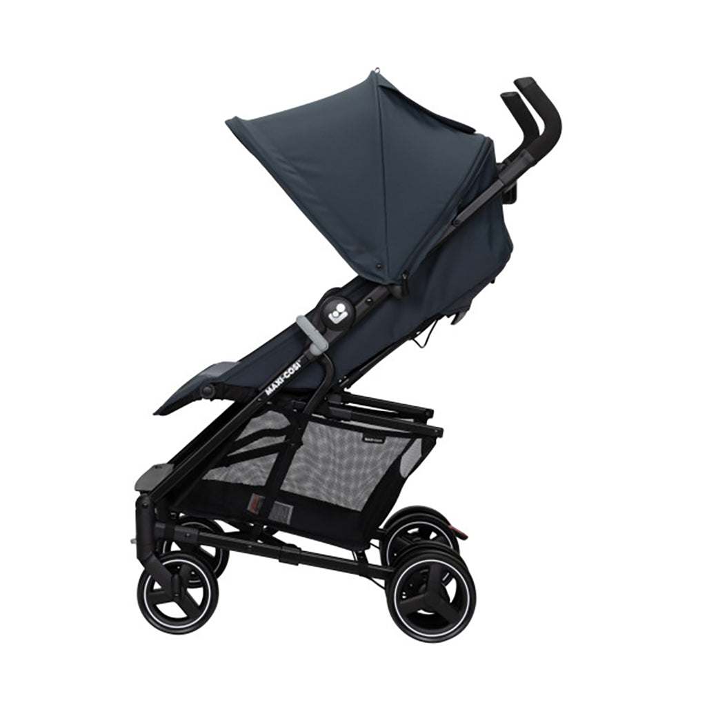 Maxi Cosi compact stroller in grey, showcasing its side profile with an emphasis on portability.