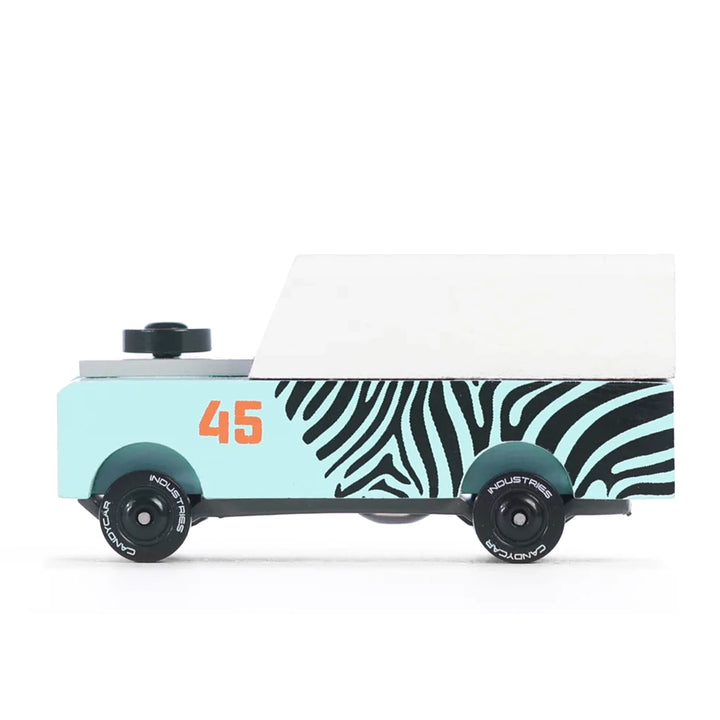 A Candylab Mini Zebra Drifter children's wooden toy vehicle, designed for fun and colorful pretend play.