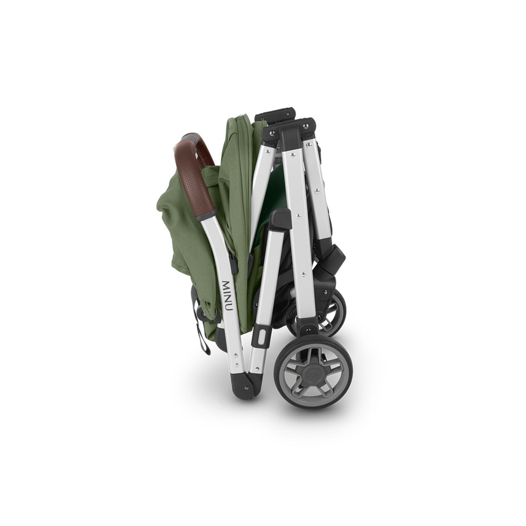 Side view of folded Uppababy stroller Minu V2 in Emelia Green