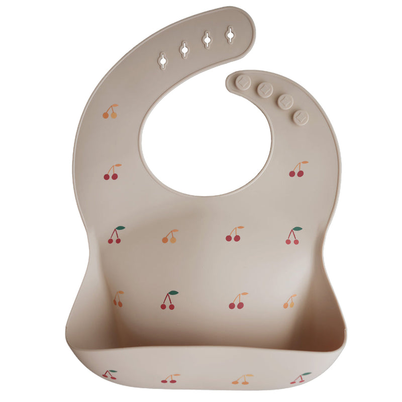 Mushie Cherries Silicone Bib Playful cherries design silicone bib for babies to keep clean during meals