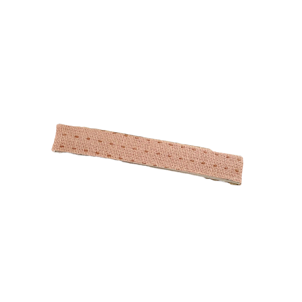 Hello Tartlet Nutmeg Large Hair Clip Accessory. Light pink hair clip with embroidering throughout.