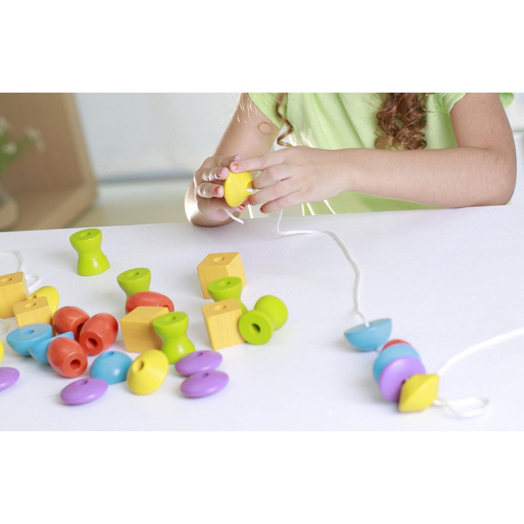 lifestyle_1, Plan Toys Lacing Beads 30 Children's Wooden Activity Toy multicolored shapes