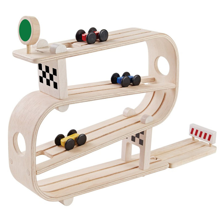 PlanToys Children's Wooden Pretend Play Car Ramp Racer Playset, engaging kids in imaginative pretend play with a car ramp design.