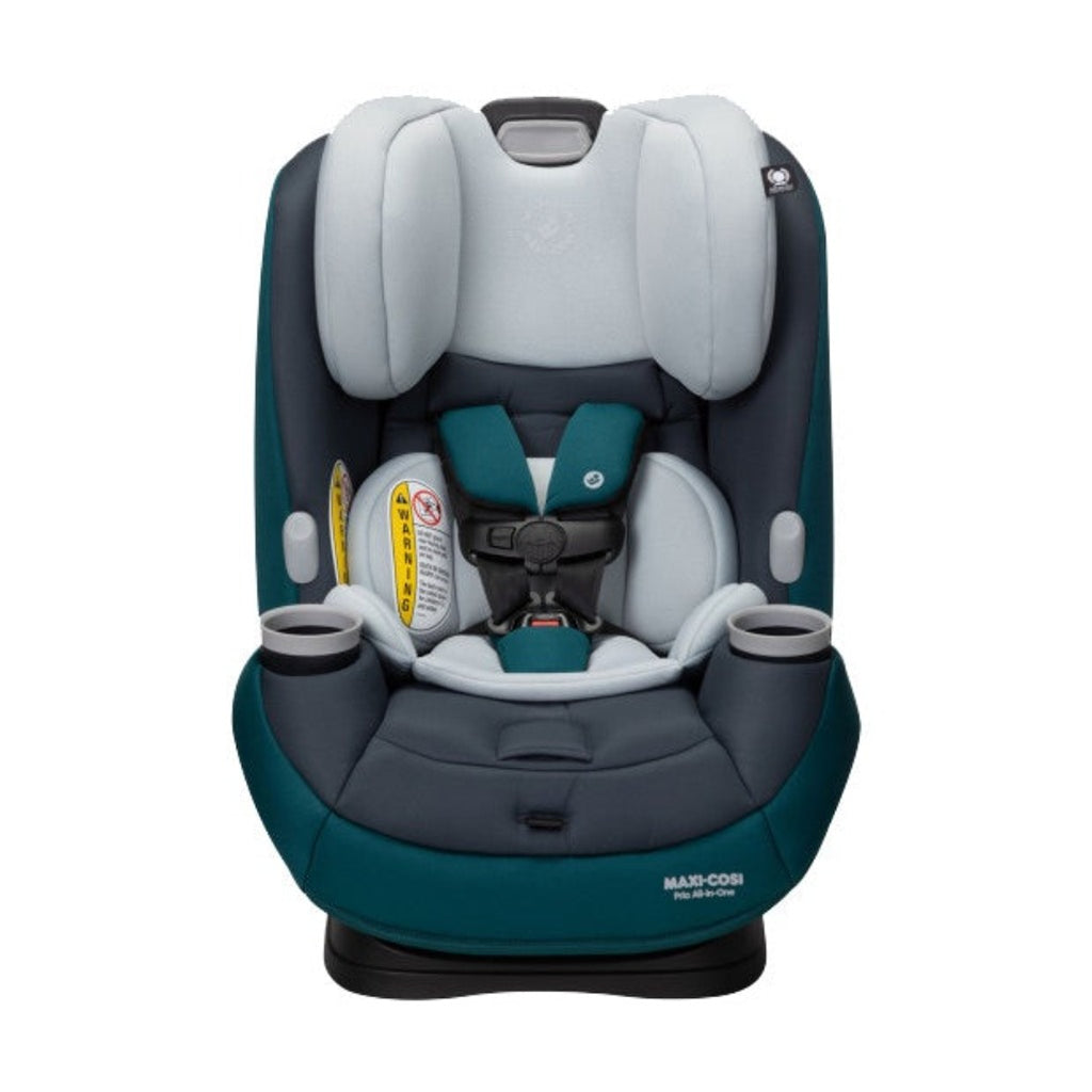 Maxi Cosi Pria All-in-One Convertible Baby Car Seat in green and navy blue, with black base, rear-facing car seat