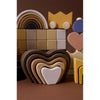 lifestyle_1, Raduga Grez Heart Arch Stacker Children's Wooden Stacking Toy layered brown orange yellow beige taupe