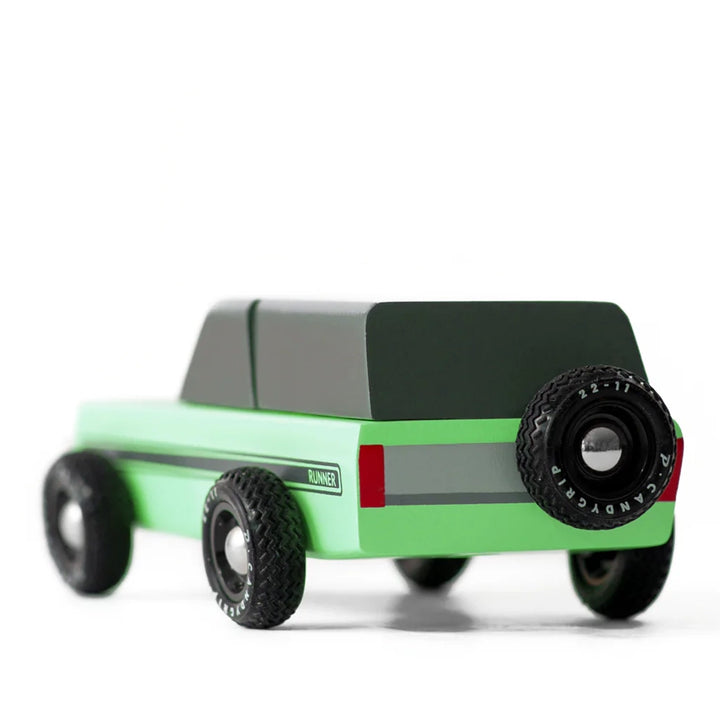 The back of the Candylab Runner vintage wooden toy vehicle, highlighting the design and colors of the car.
