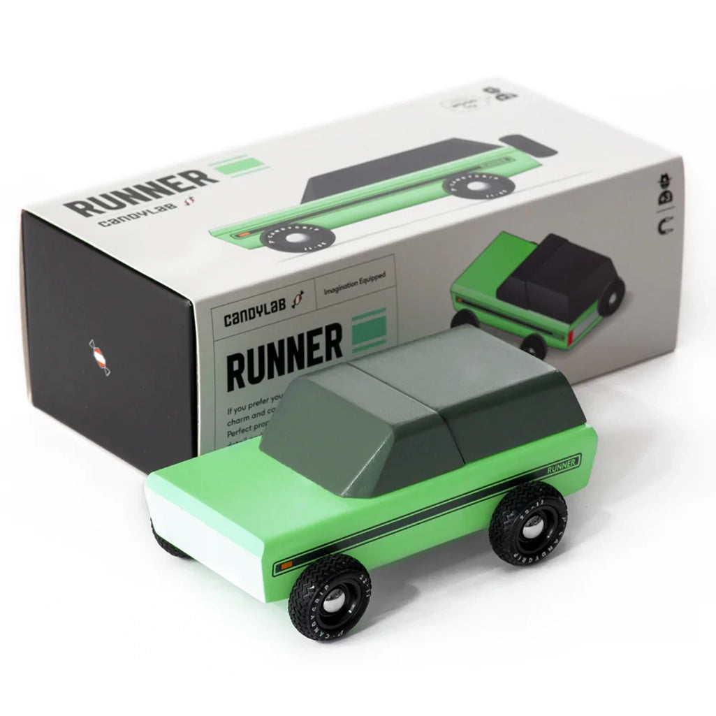 A Candylab Runner vintage toy vehicle in green and black, shown with packaging for display or gifting.