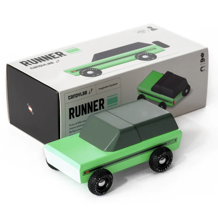 A Candylab Runner vintage toy vehicle in green and black, shown with packaging for display or gifting.