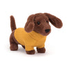 Jellycat Yellow Sweater Sausage Dog Children's Stuffed Animal Toy. Dark brown sausage dog with yellow sweater. Front view.