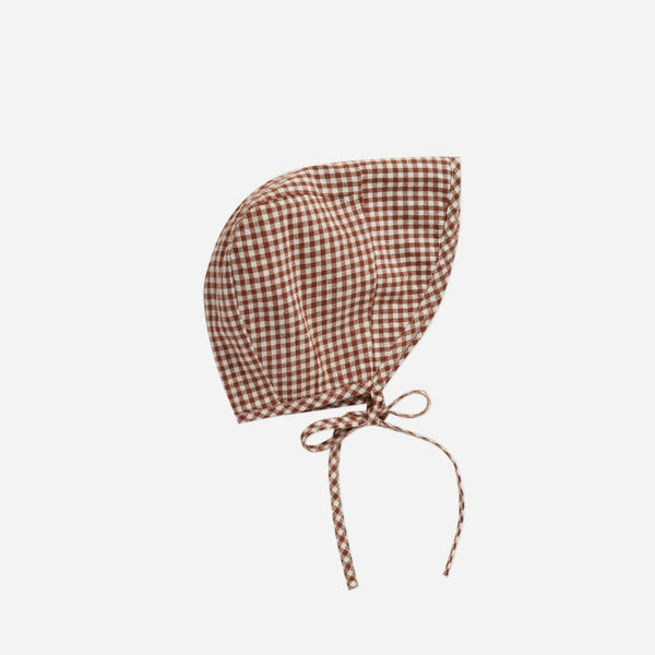 Don't leave the house without getting your baby sun-ready with these Brimmed Bonnets by Rylee + Cru! Cute and versatile these bonnets are the best of both worlds and they go with any outfit. Red and white checkered pattern.