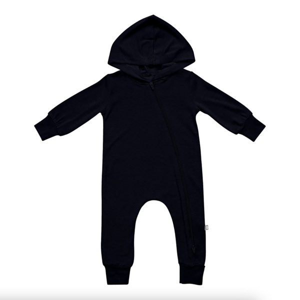 Kyte Baby Infant and Toddler Midnight Hooded Zippered Romper - The black romper is spread out and displayed on a white background with a zipper running from the middle of the neckline down the center to the bottom of the left leg